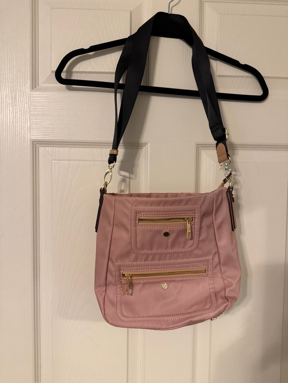 Woman’s canvas crossbody/shoulder bag by Utility in rose pink